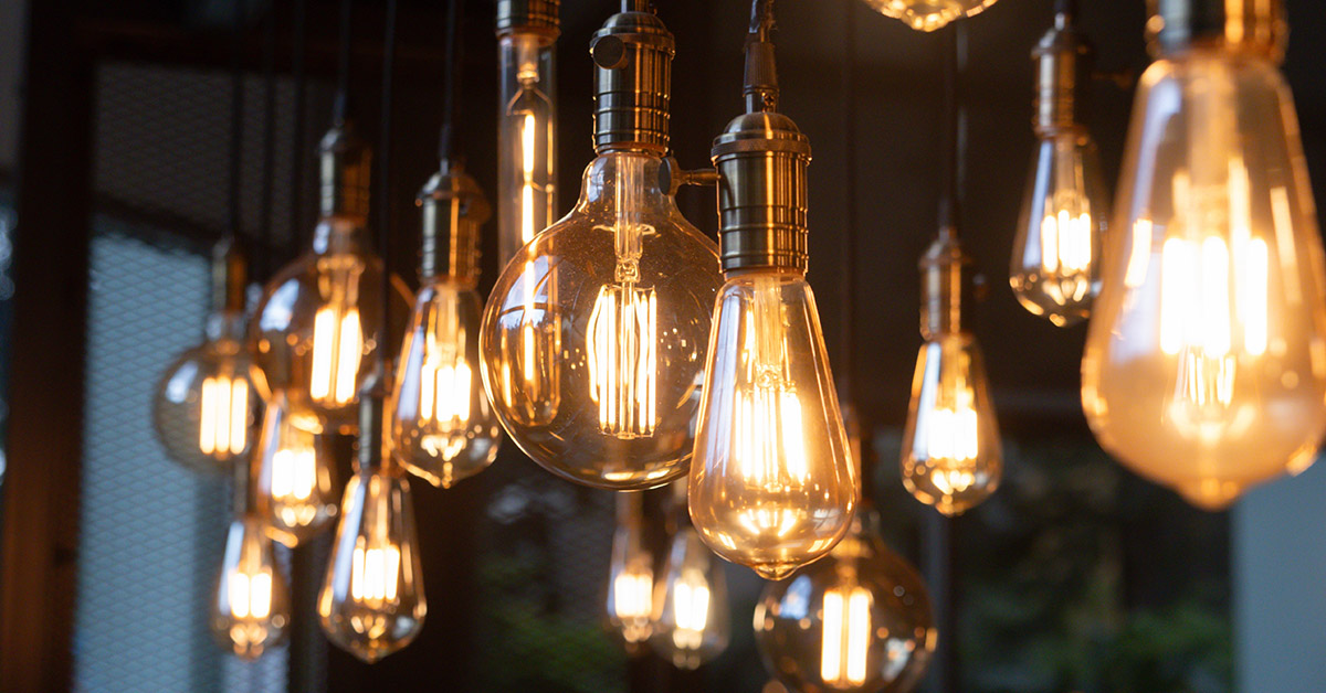 lightbulbs hanging from ceiling representing an intellectual property idea